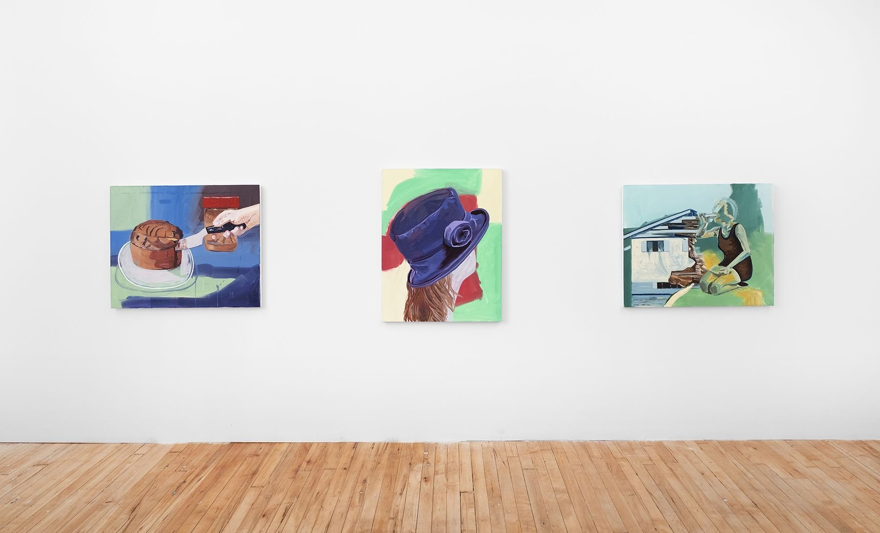 Installation view of three paintings by Madeline Bohrer on a gallery wall